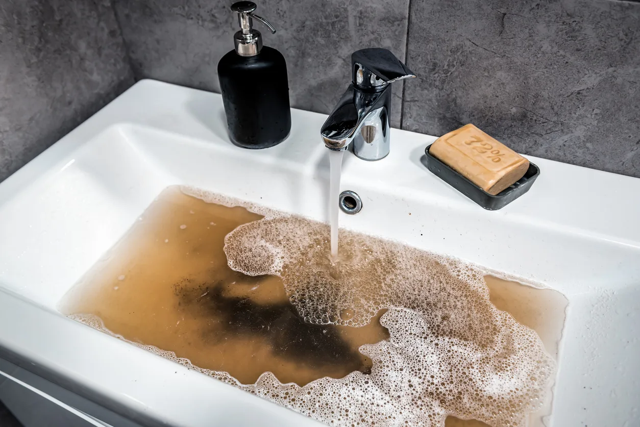 Pete Phend explaining drain prevention tips for East Valley homeowners