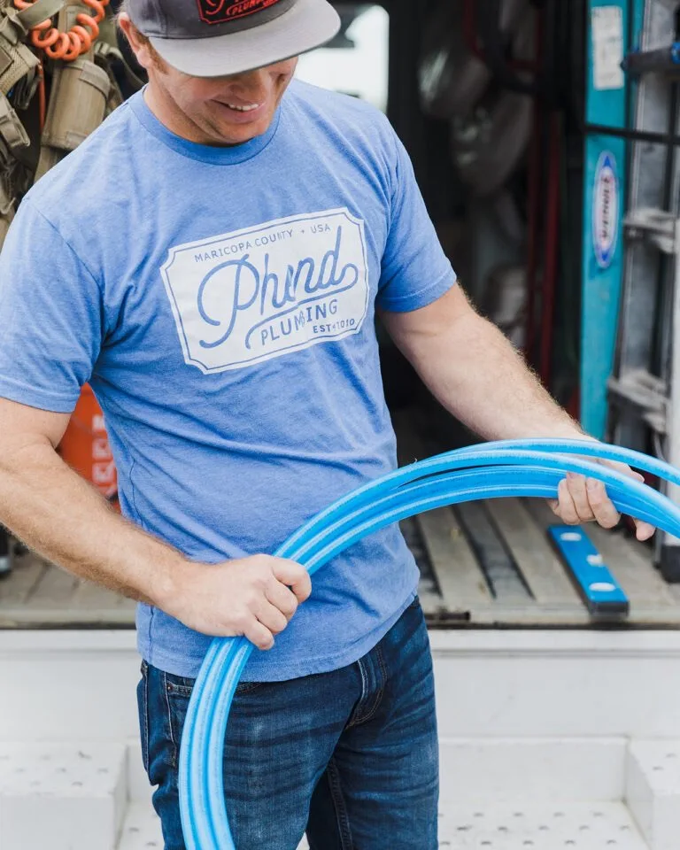 Phend Plumbing technician connecting new PEX-A supply lines during a whole-home repipe in an East Valley home