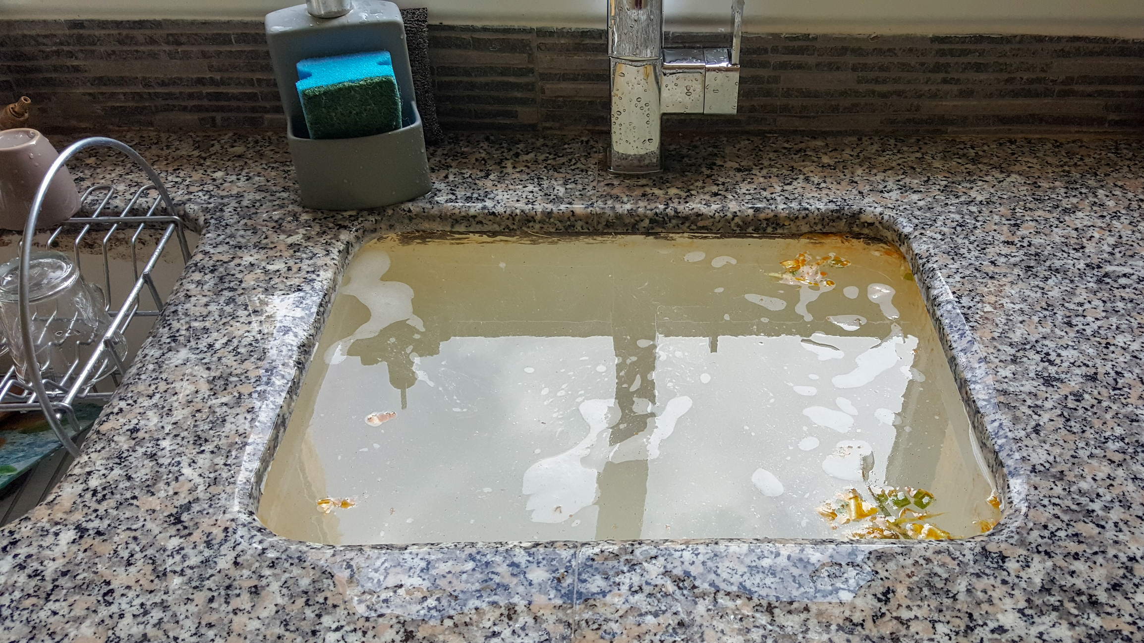 Kitchen sink plugged or draining slow??? We can fix it Call us